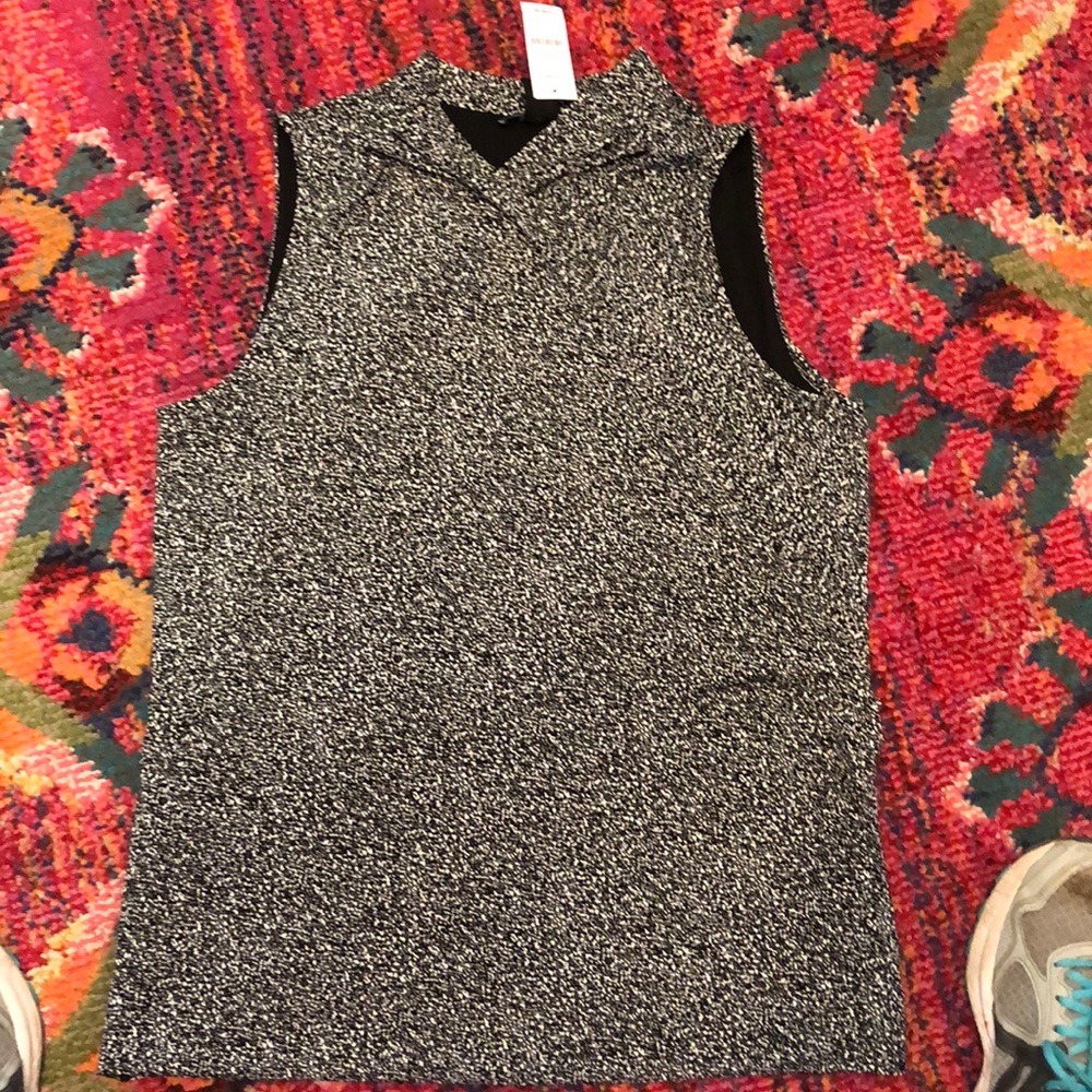 Sleeveless black blouse